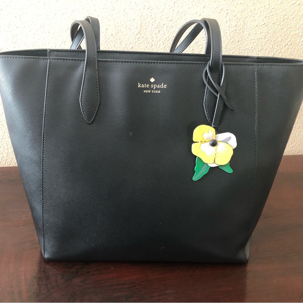 Kate spade leather zip tote with removable flower charm